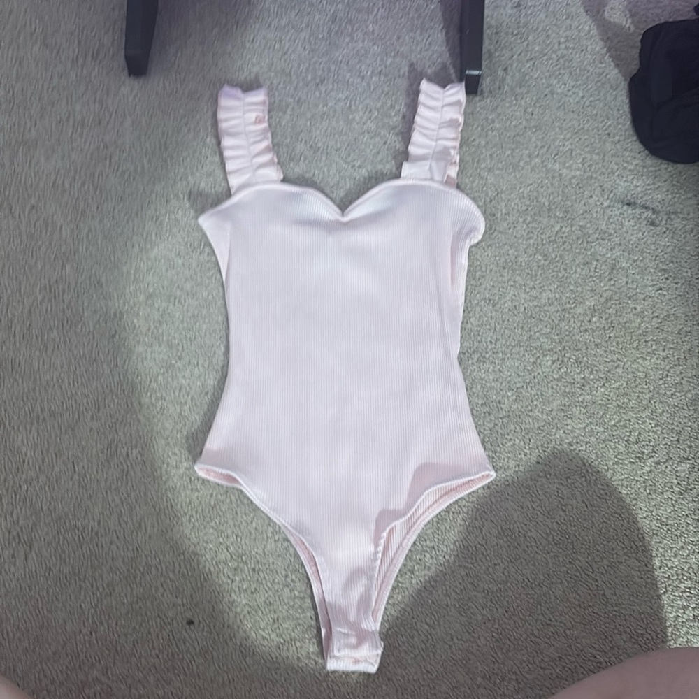 brand new francesca’s pink body suit